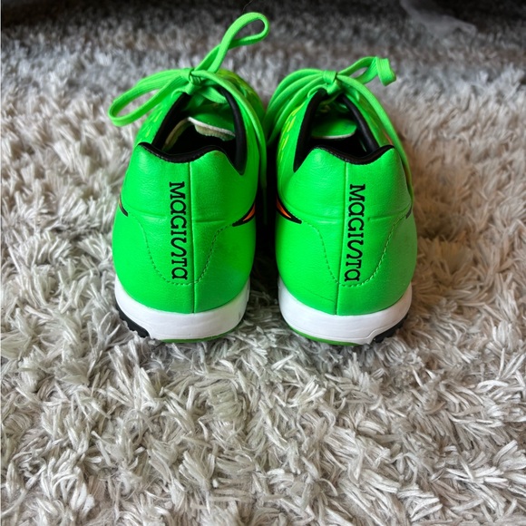 NIKE. Low cleat soccer shoes. Lime green with orange swish detailing. Size 8 - Picture 3 of 4